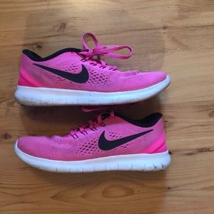 Hot pink Nike Free RN Running Shoes